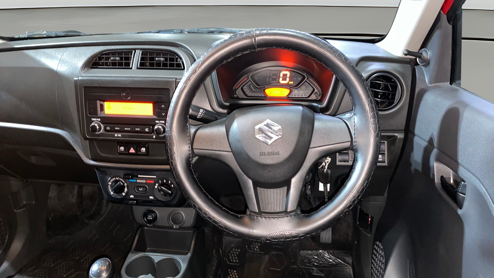 Dashboard and steering wheel of a Maruti Suzuki Alto K10