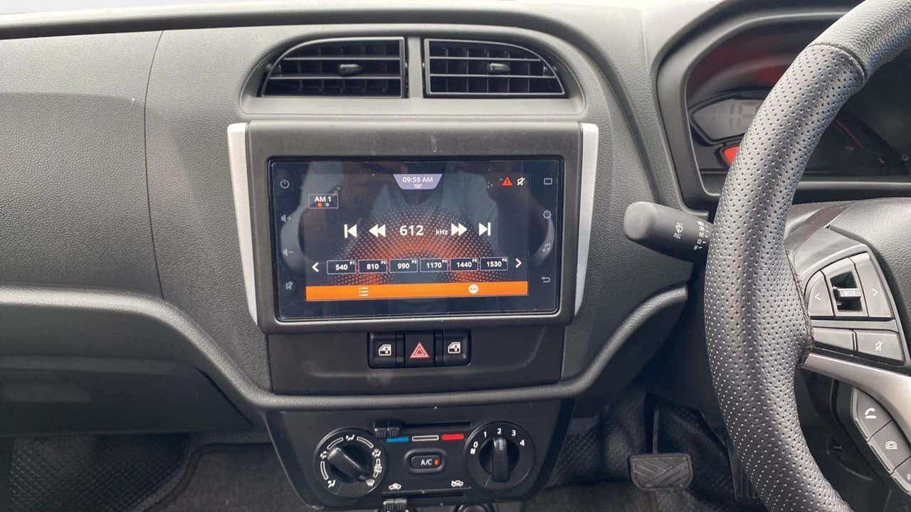 Interior dashboard view of a Maruti Suzuki Alto K10