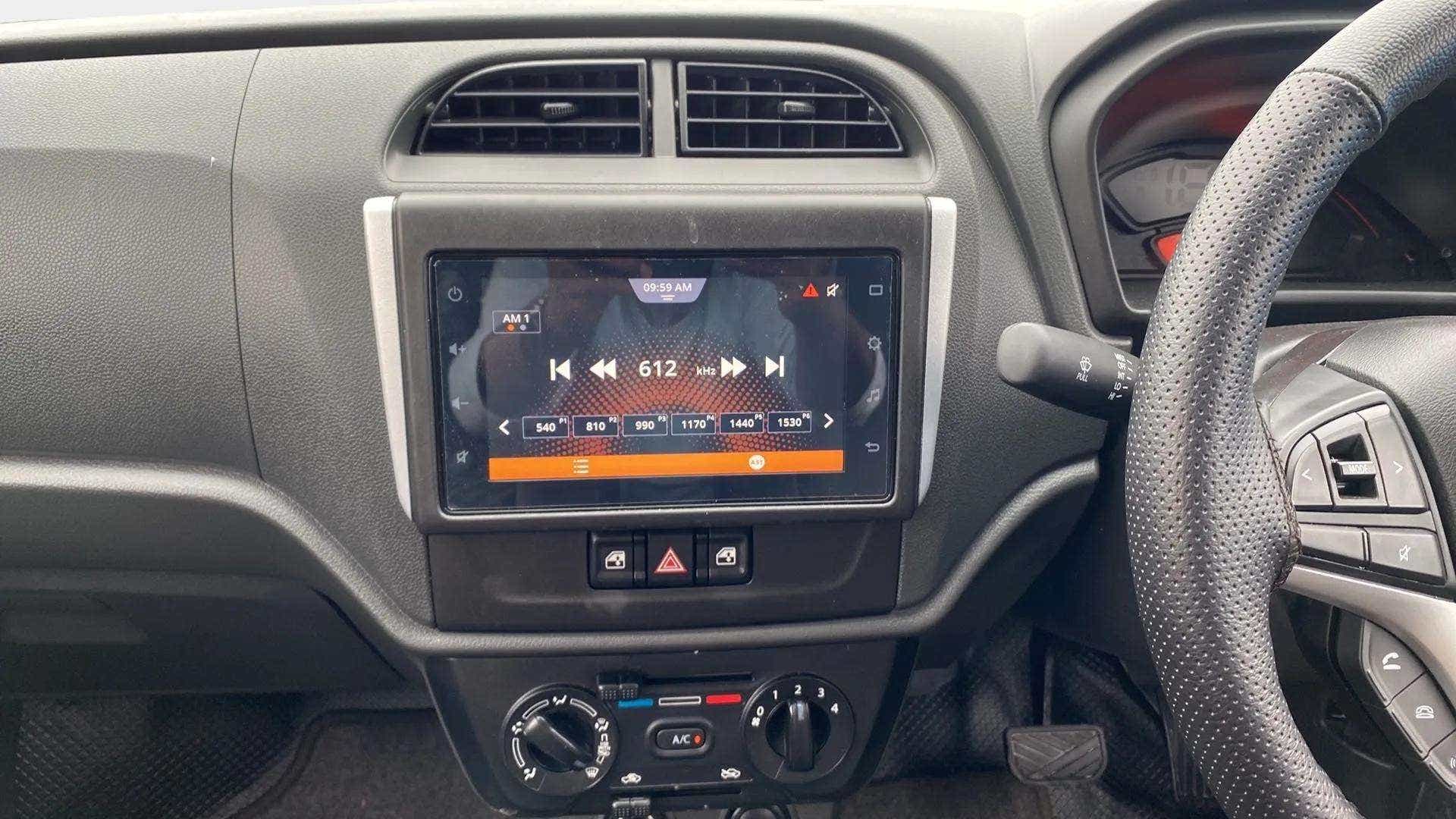 Interior dashboard view of a Maruti Suzuki Alto K10