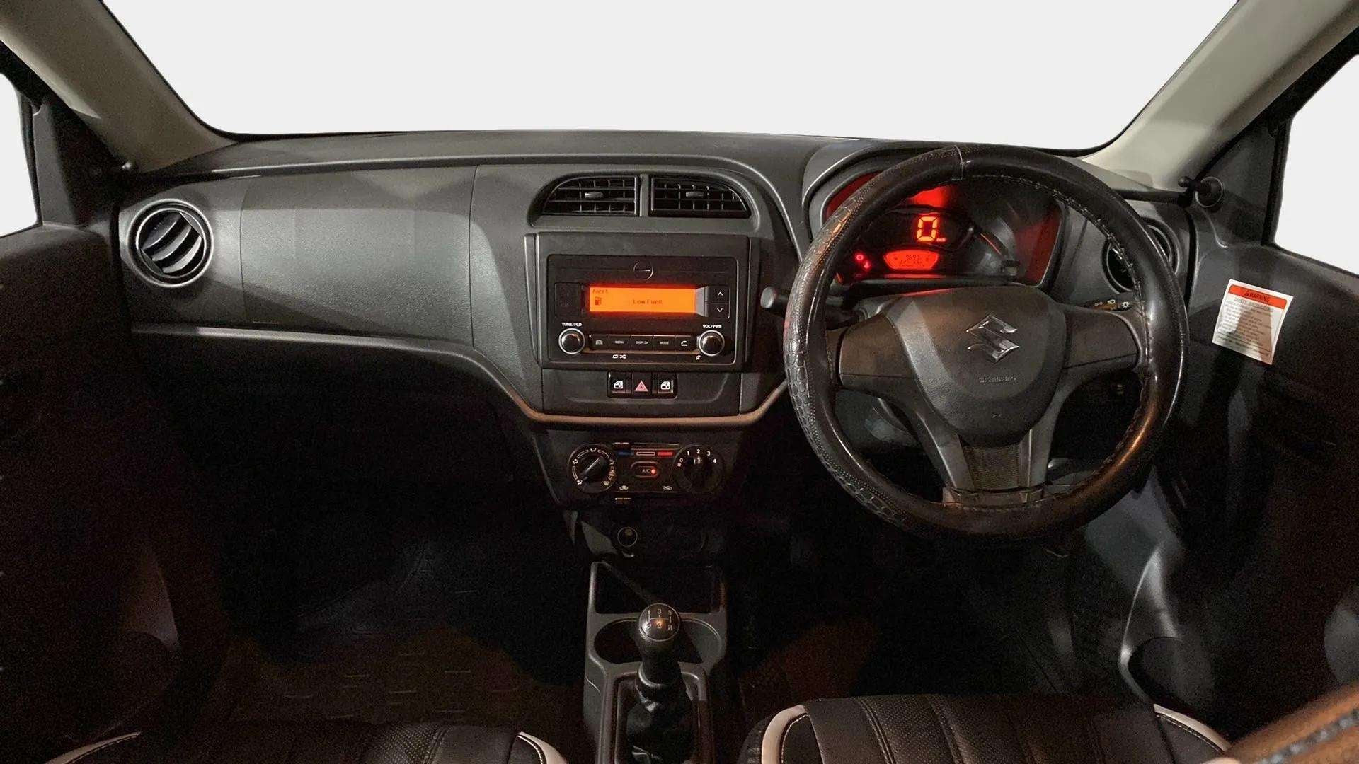 Interior dashboard view of a Maruti Suzuki Alto K10