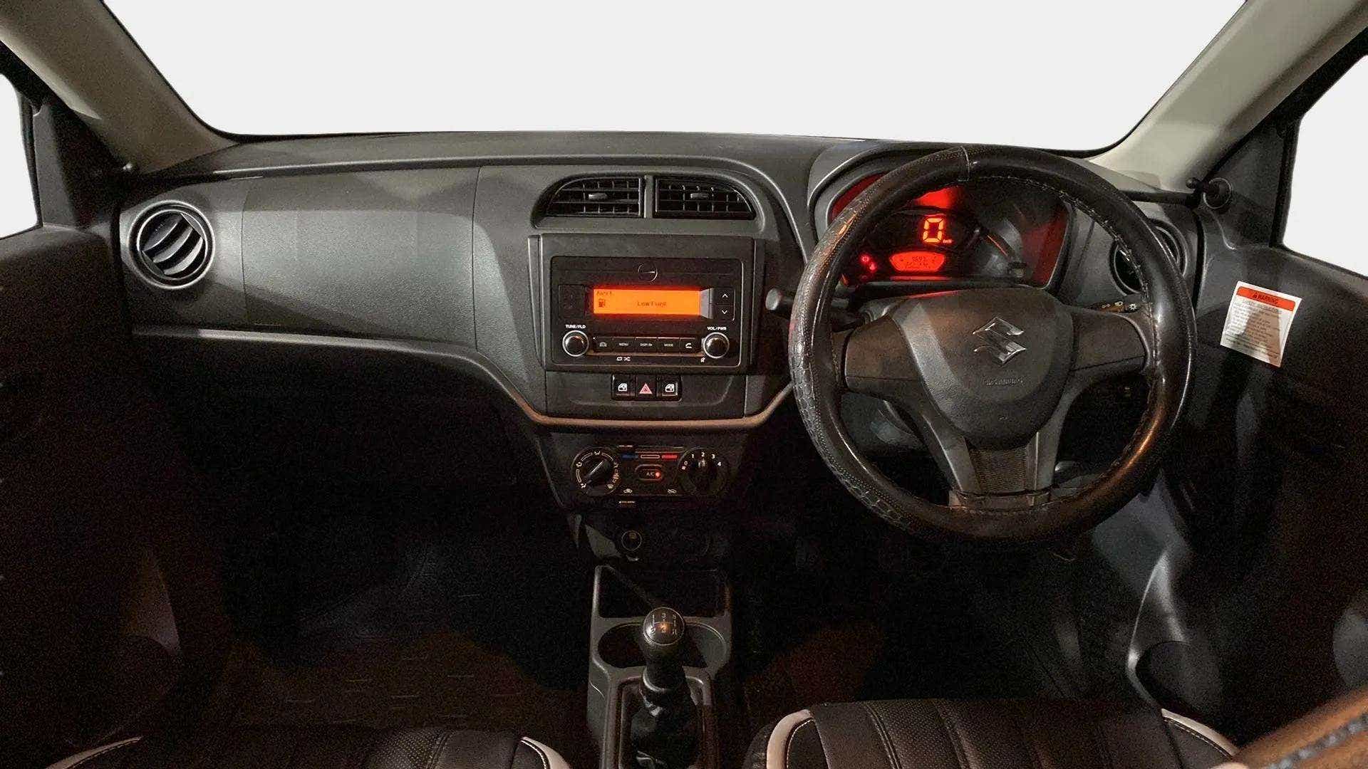Interior dashboard view of a Maruti Suzuki Alto K10