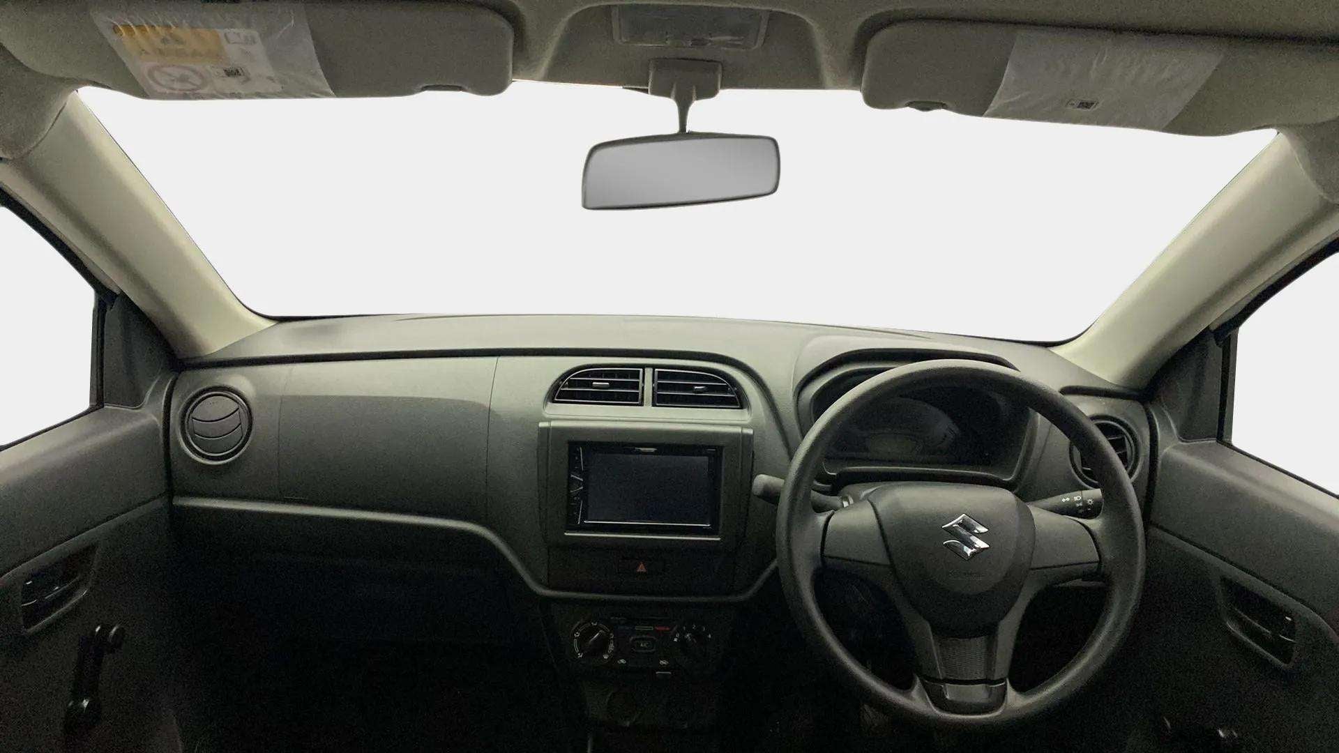 Interior dashboard view of a Maruti Suzuki Alto K10