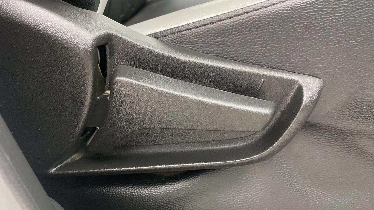Close-up of an interior door handle of a Maruti Suzuki Alto K10