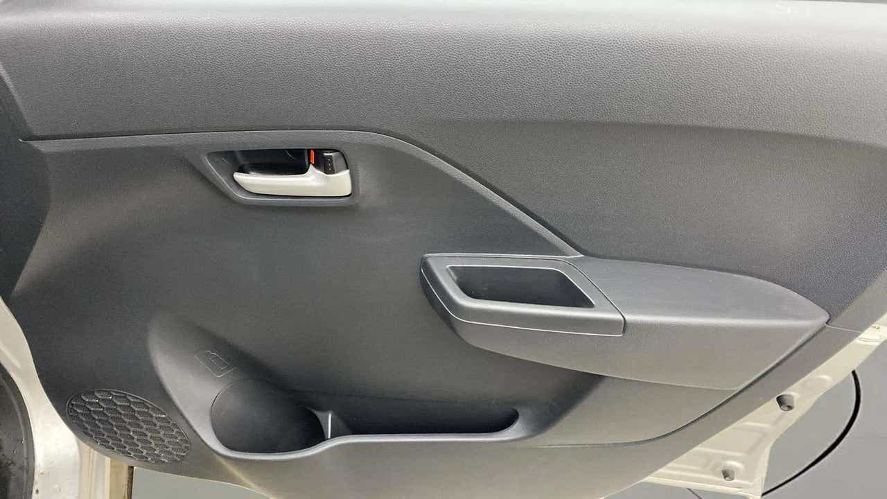 Interior front door panel of a Maruti Suzuki Alto K10