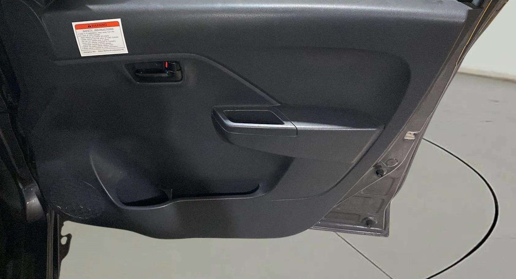 Interior door panel of a Maruti Suzuki Alto K10