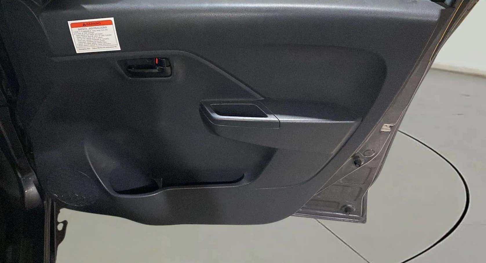 Interior door panel of a Maruti Suzuki Alto K10