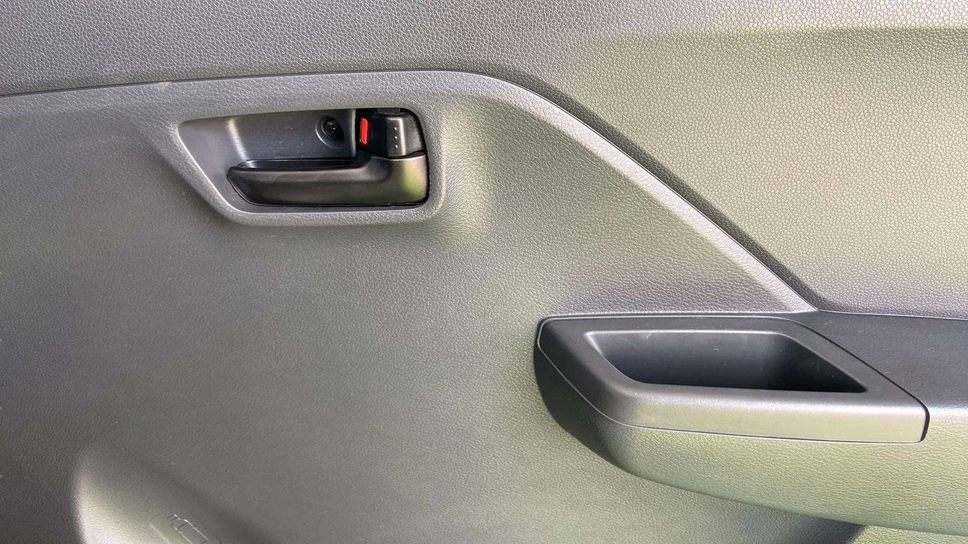 Interior door panel of a Maruti Suzuki Alto K10