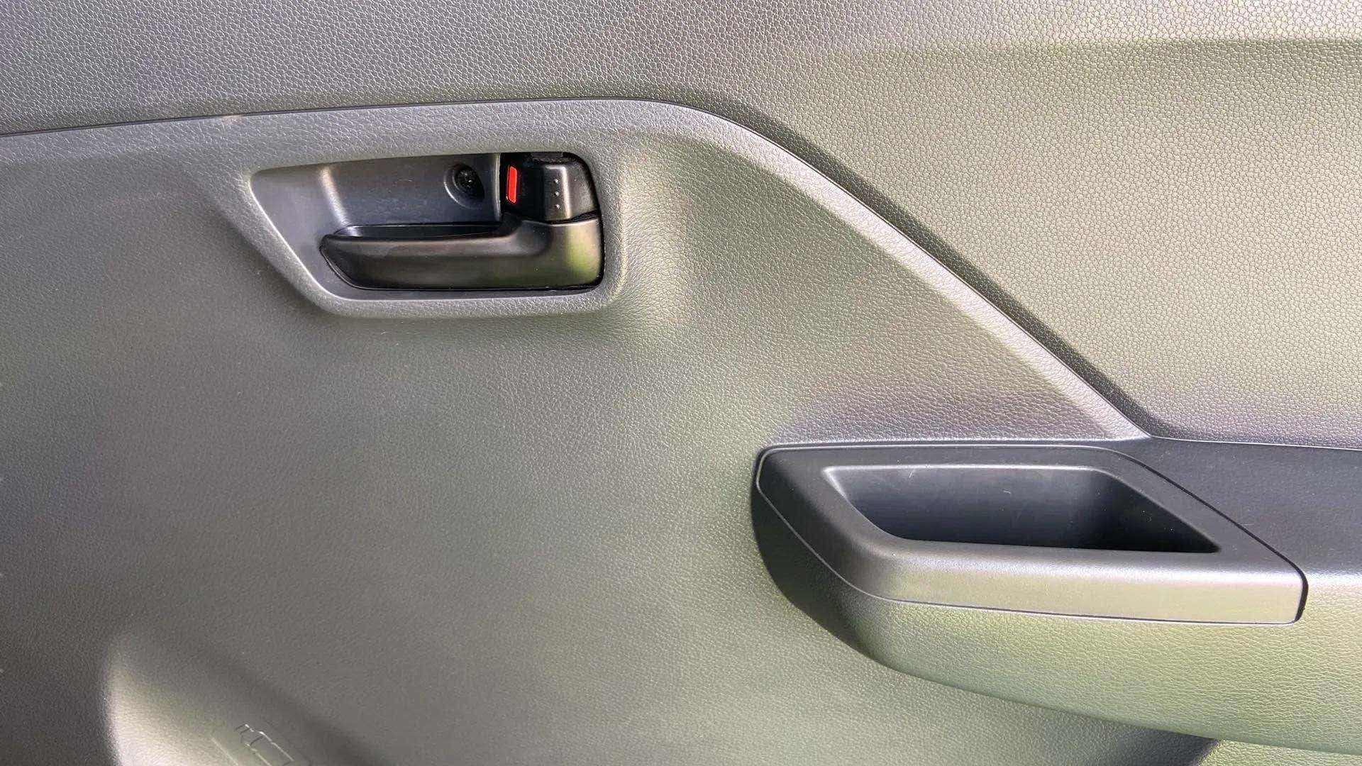 Interior door panel of a Maruti Suzuki Alto K10