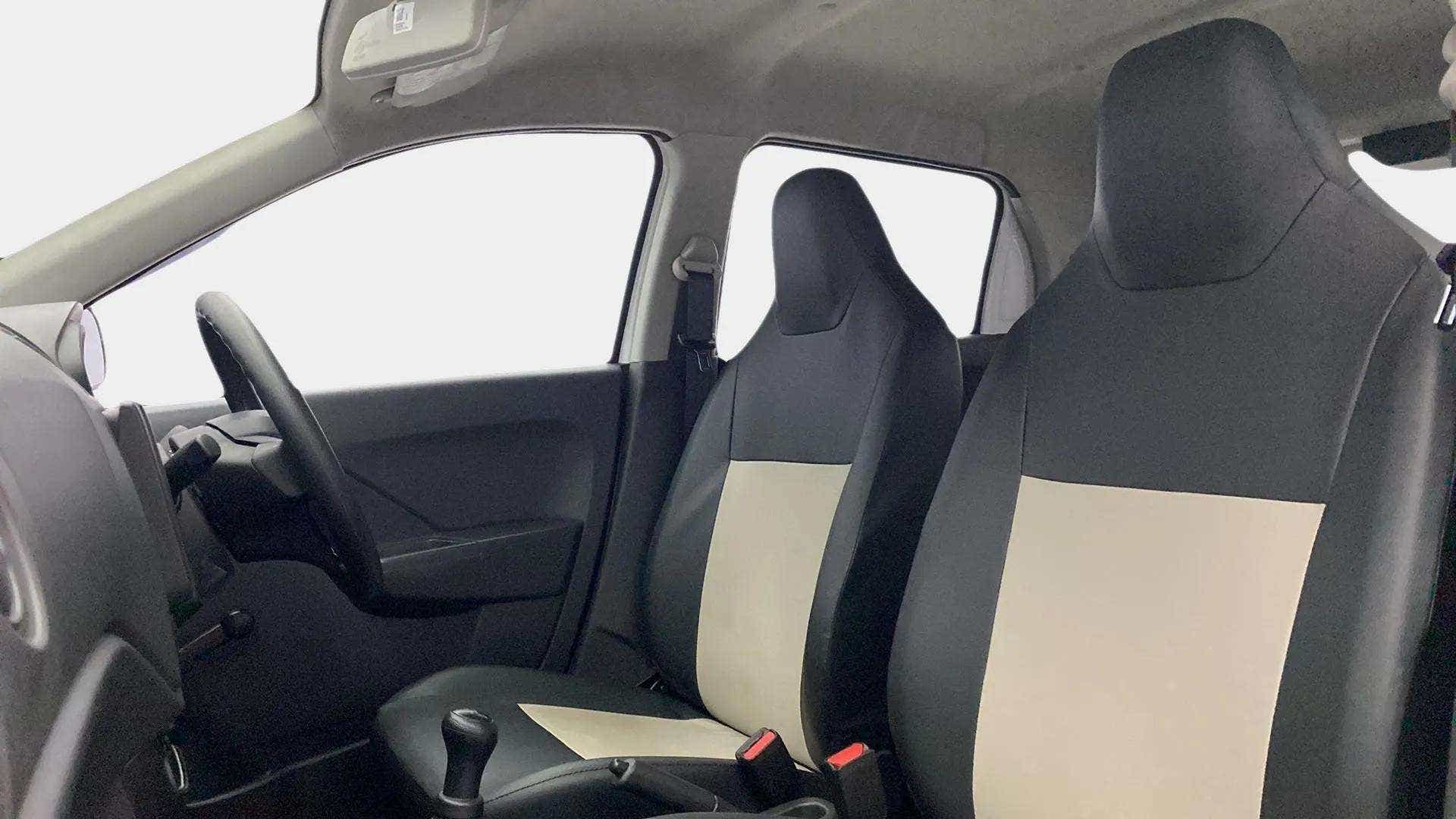 Front interior seats and dashboard of a Maruti Suzuki Alto K10