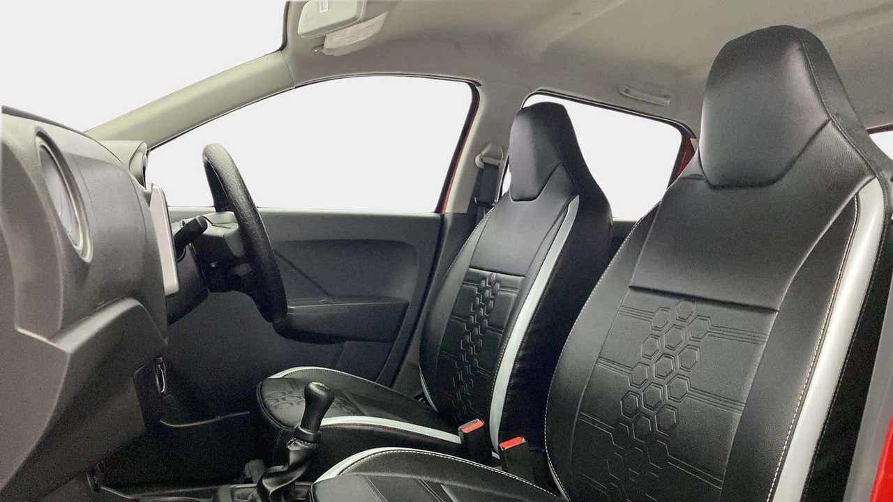Front seats and dashboard view of a Maruti Suzuki Alto K10