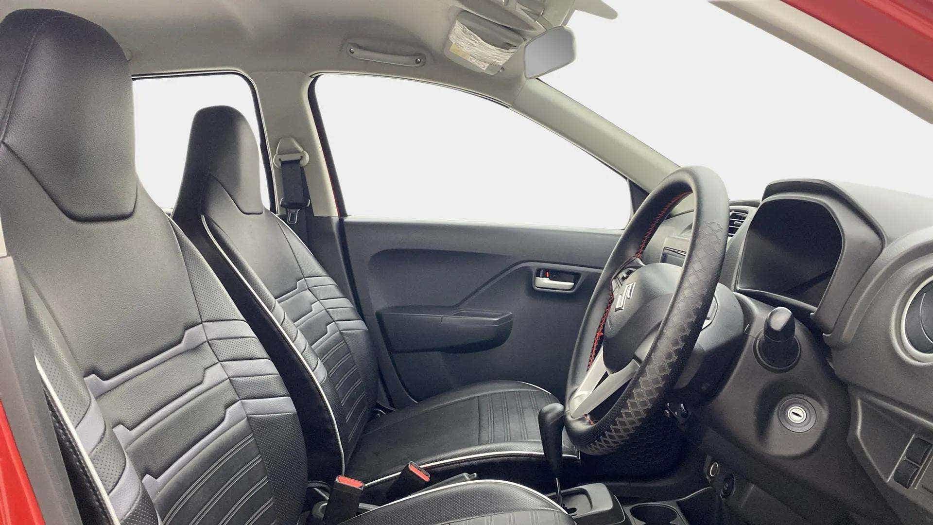Interior dashboard view of a Maruti Suzuki Alto K10