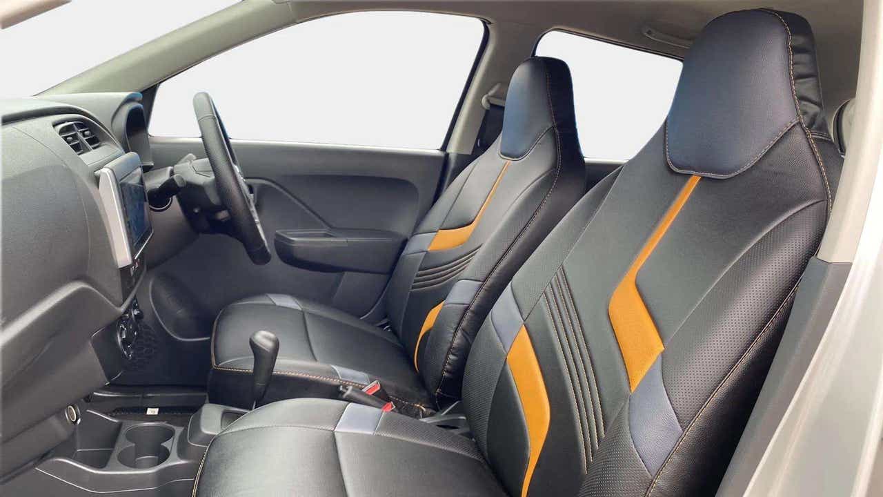Front interior seats and dashboard of a Maruti Suzuki Alto K10