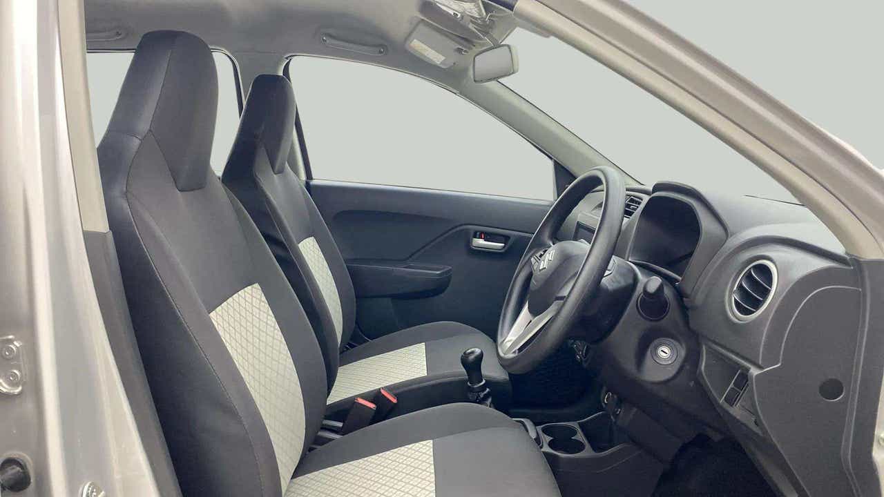 Interior dashboard and front seats of a Maruti Suzuki Alto K10