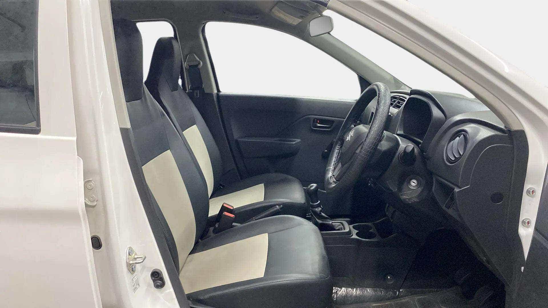 Interior front seats and dashboard of a Maruti Suzuki Alto K10