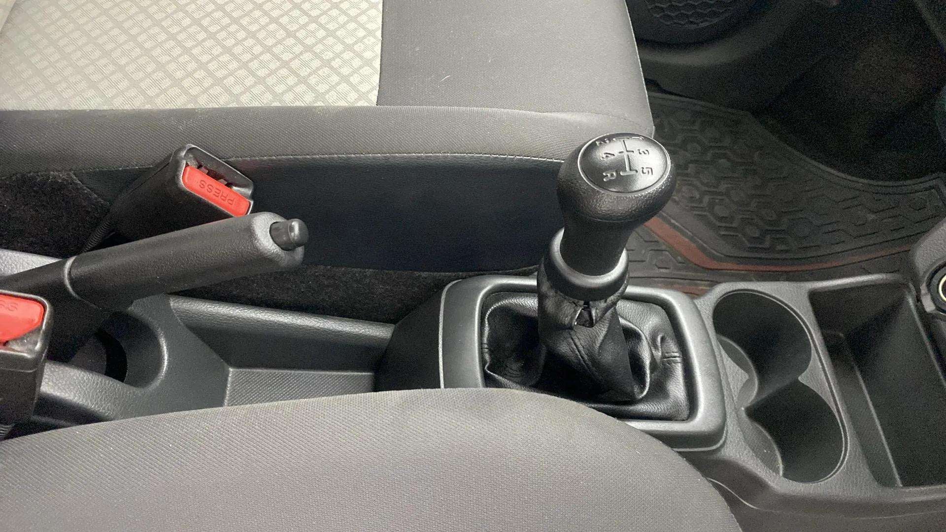 Gear lever and handbrake area of a Maruti Suzuki Alto K10