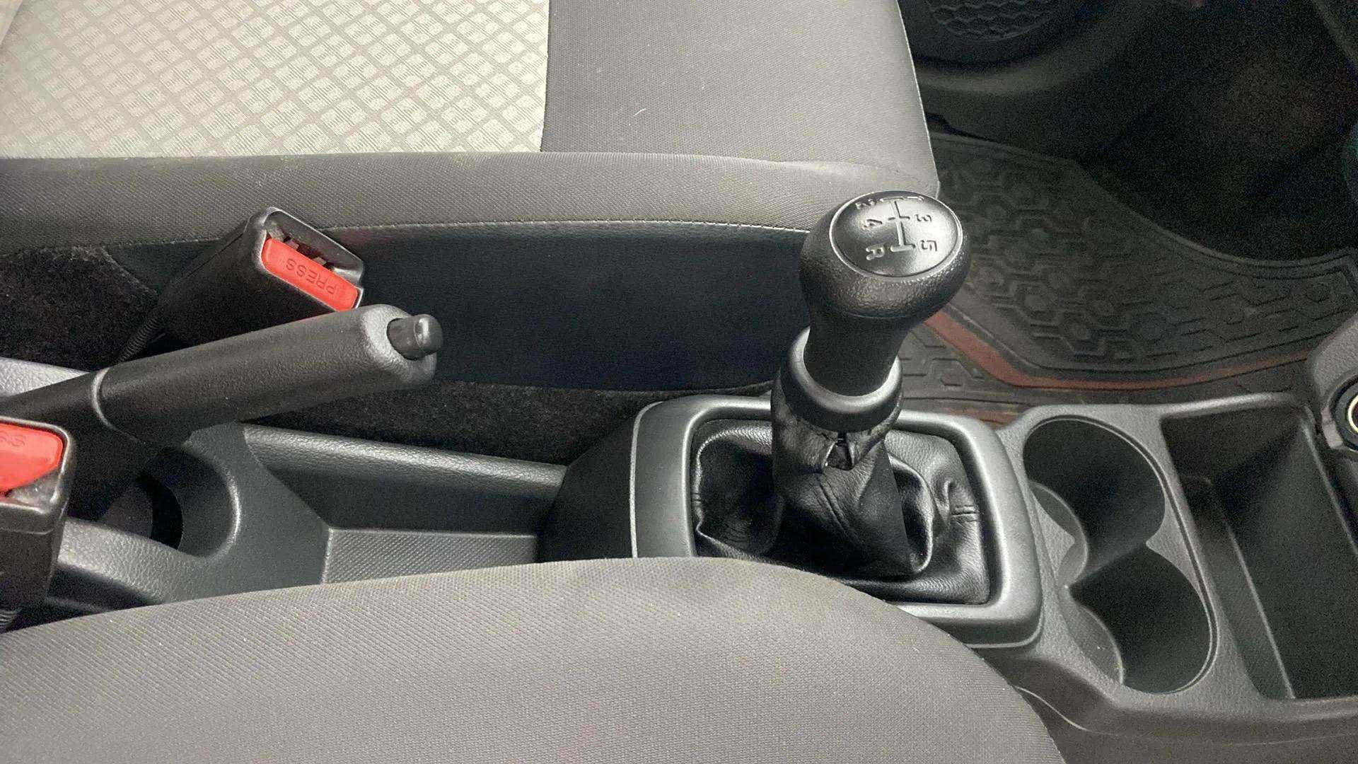 Gear lever and handbrake area of a Maruti Suzuki Alto K10