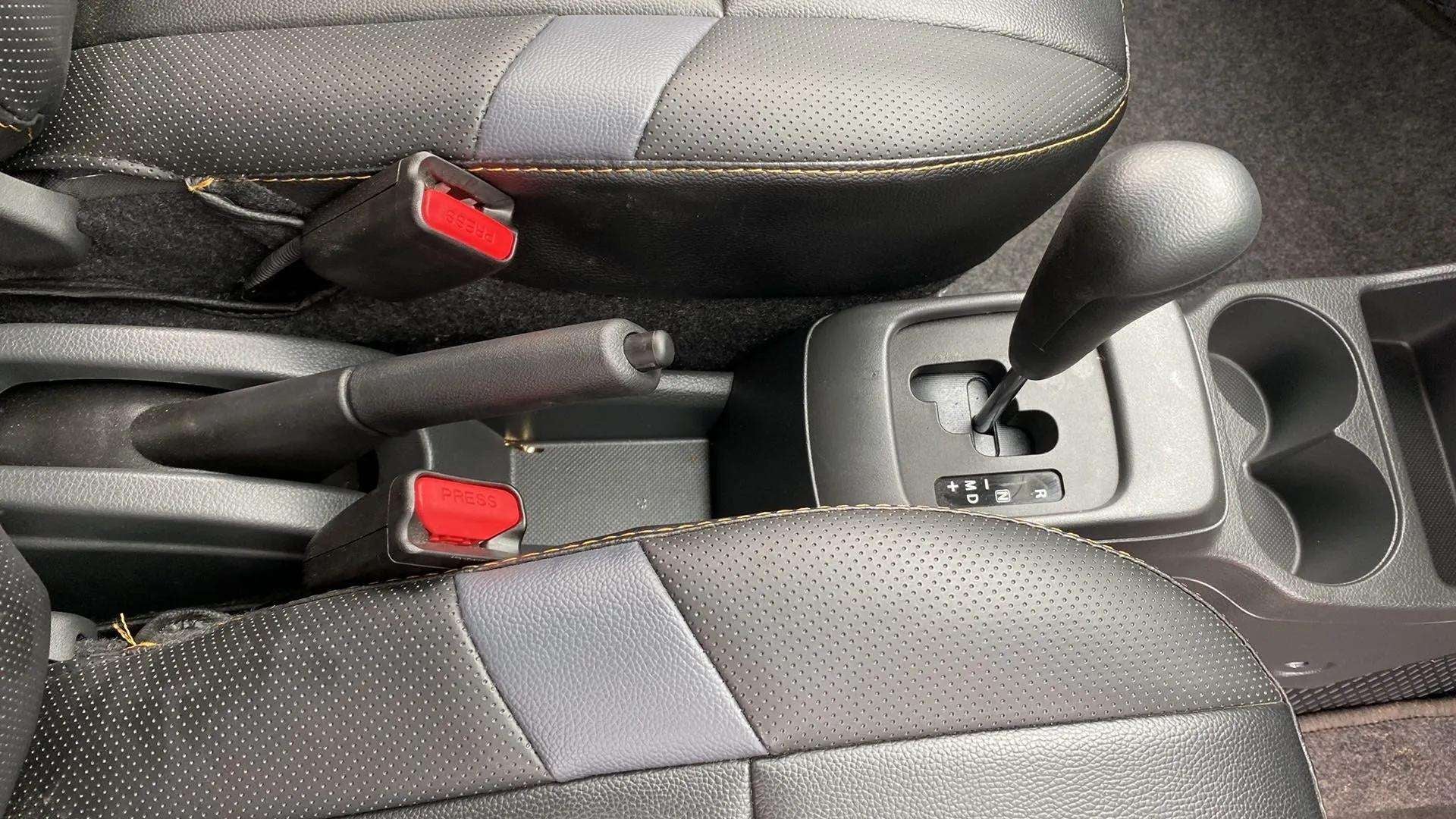 Center console and gear lever of a Maruti Suzuki Alto K10