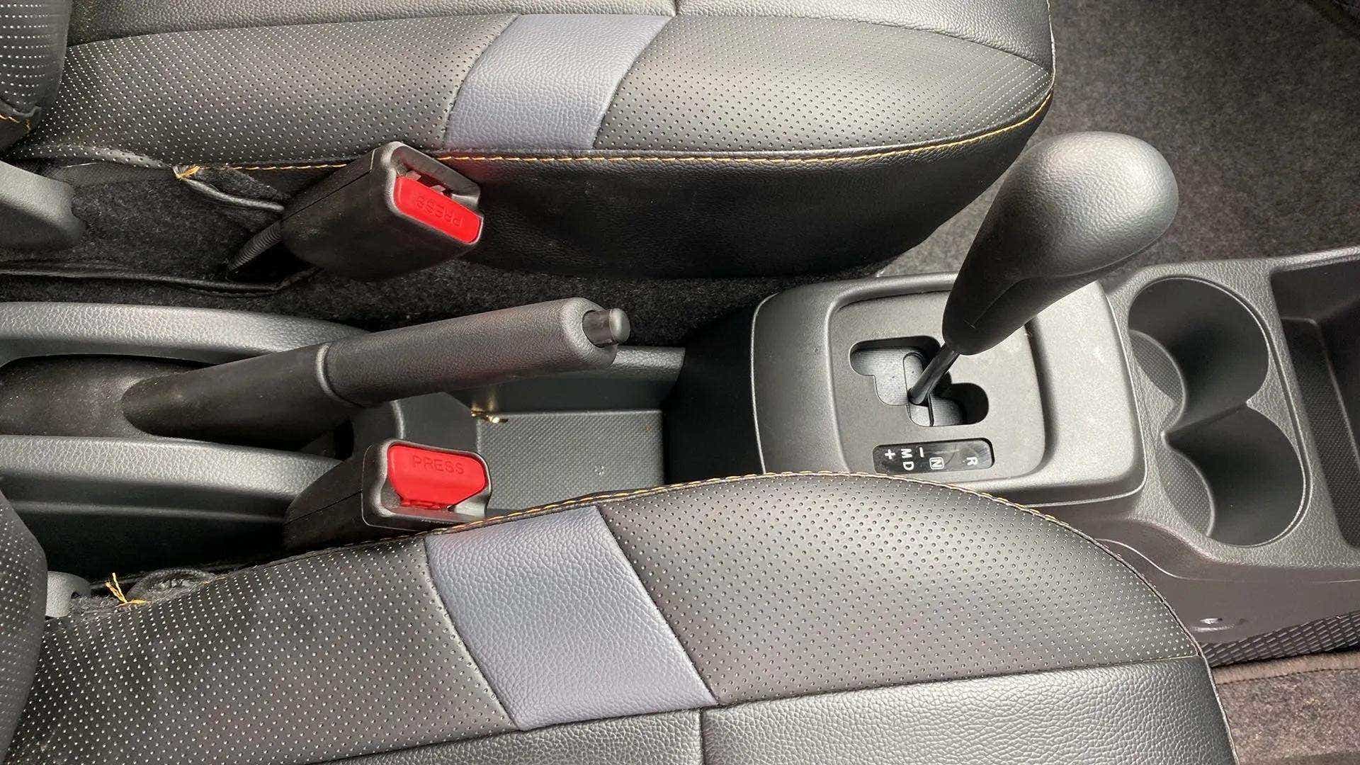Center console and gear lever of a Maruti Suzuki Alto K10