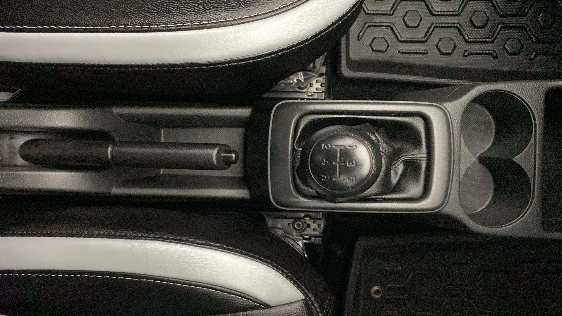 Gear shifter and handbrake area of a Maruti Suzuki Alto K10