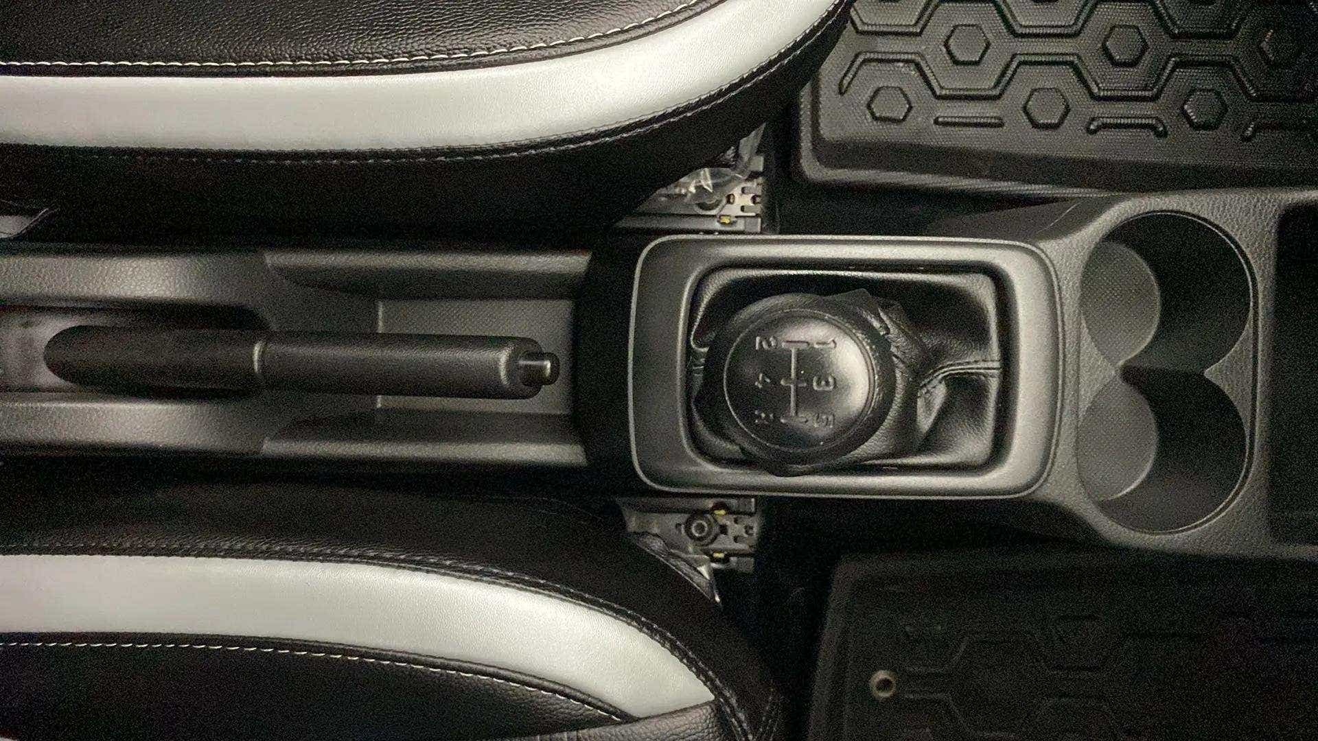 Gear shifter and handbrake area of a Maruti Suzuki Alto K10