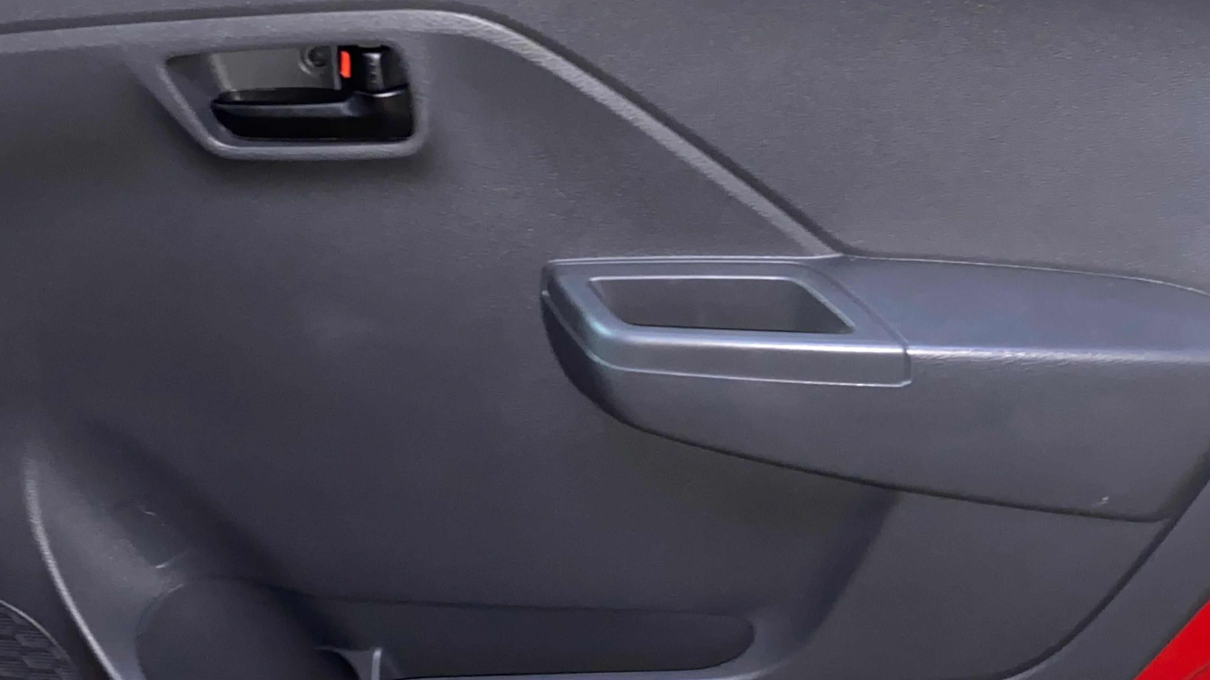Interior door panel of a Maruti Suzuki Alto K10