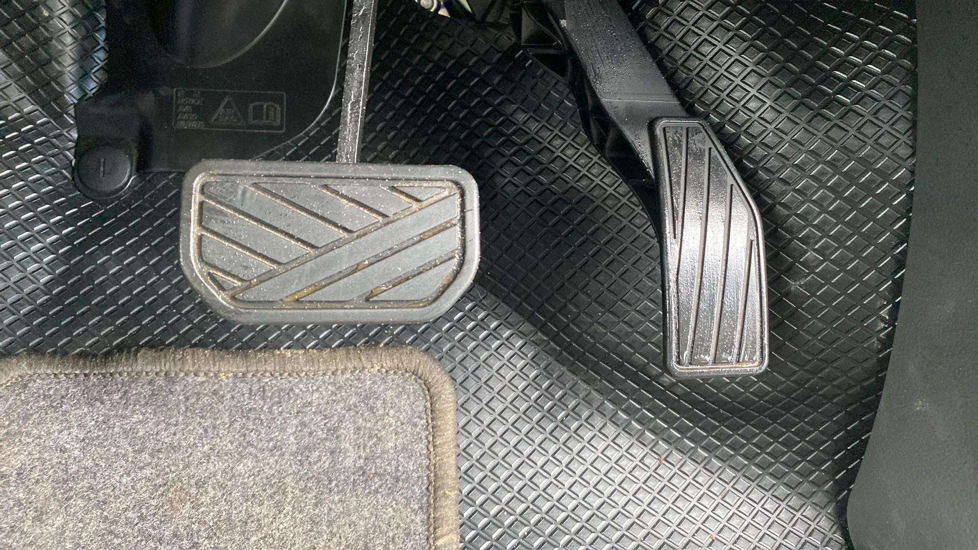 Footwell view showing pedals of a Maruti Suzuki Alto K10