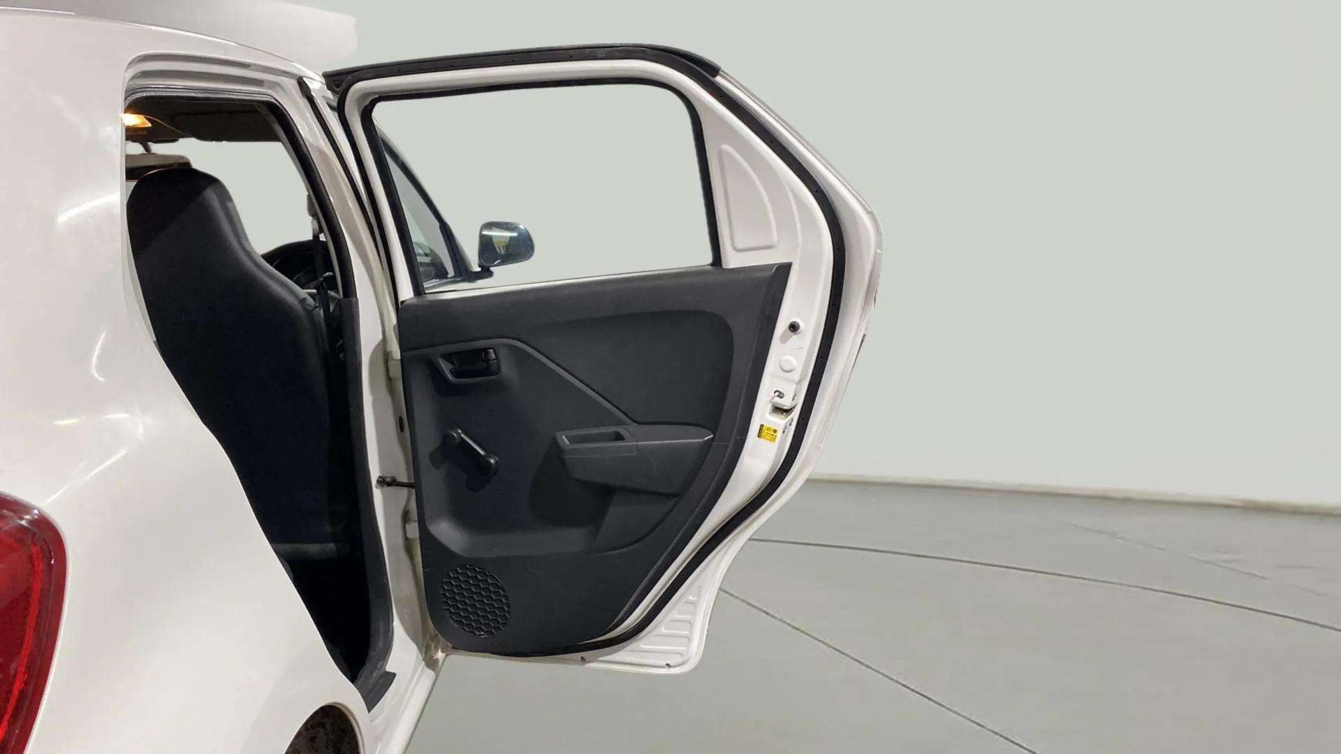 Rear left door open view of a Maruti Suzuki Alto K10