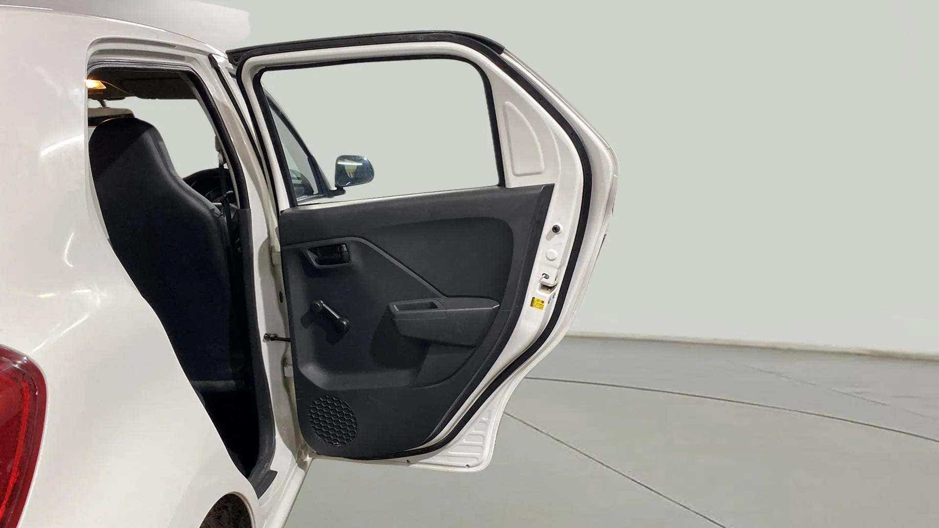 Rear left door open view of a Maruti Suzuki Alto K10