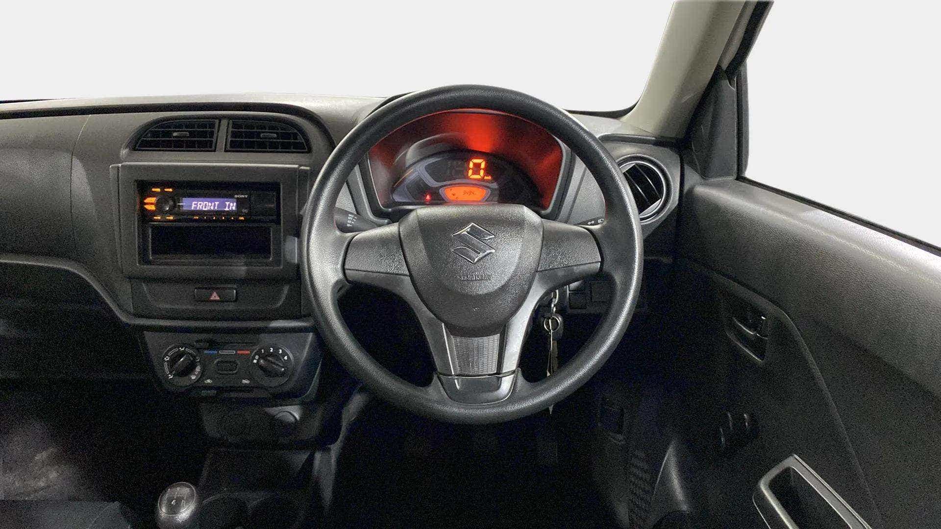 Steering wheel and dashboard of a Maruti Suzuki Alto K10