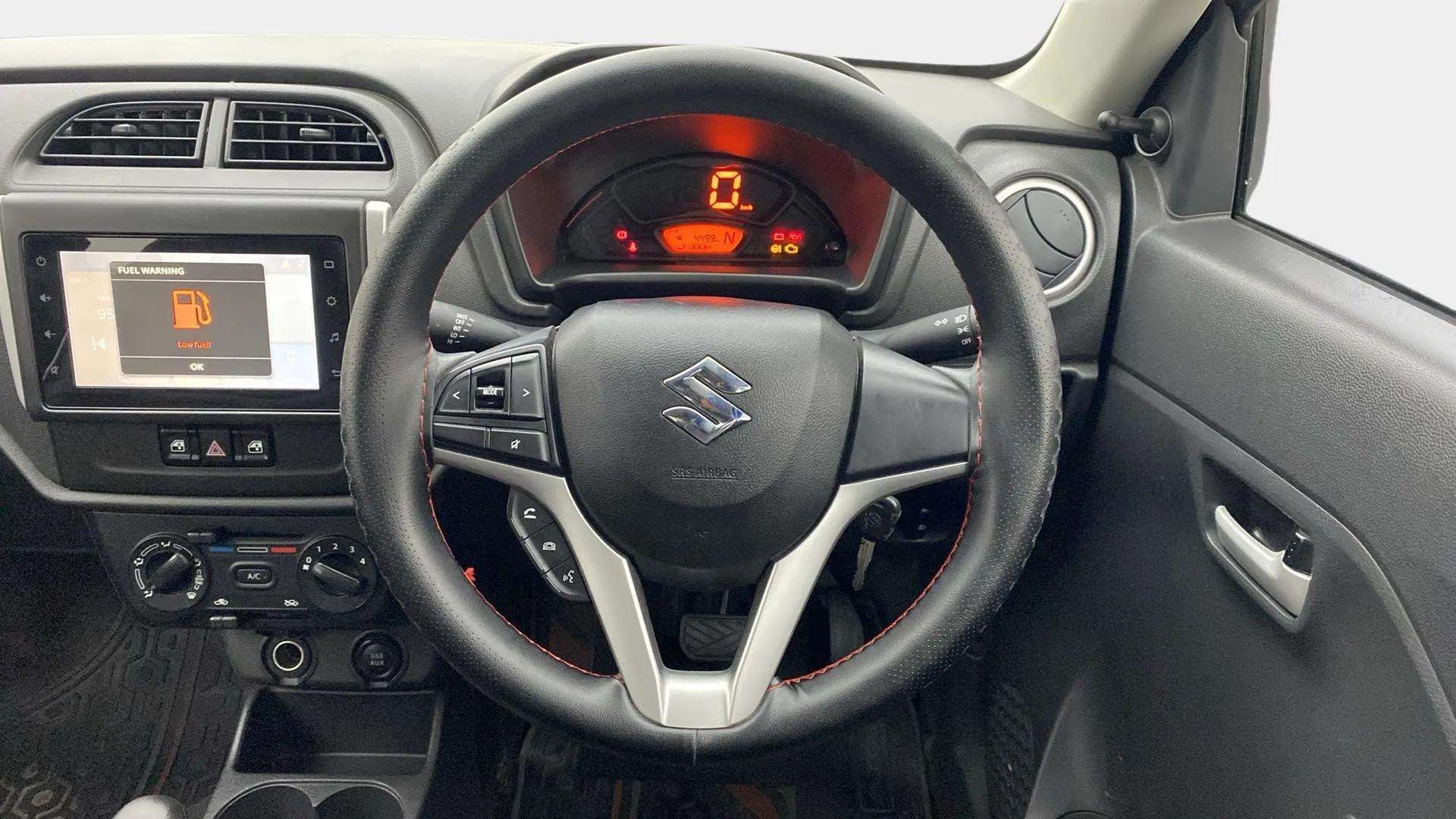 Interior dashboard view of a Maruti Suzuki Alto K10