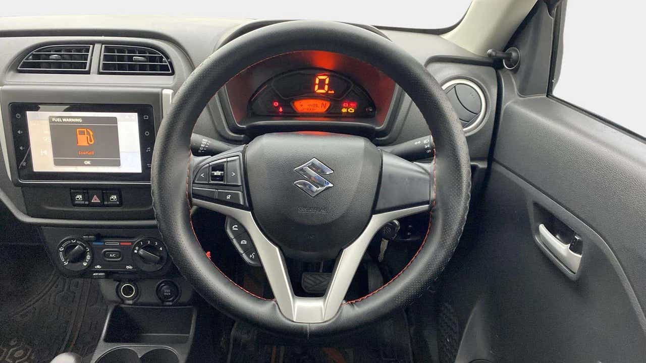 Interior dashboard view of a Maruti Suzuki Alto K10