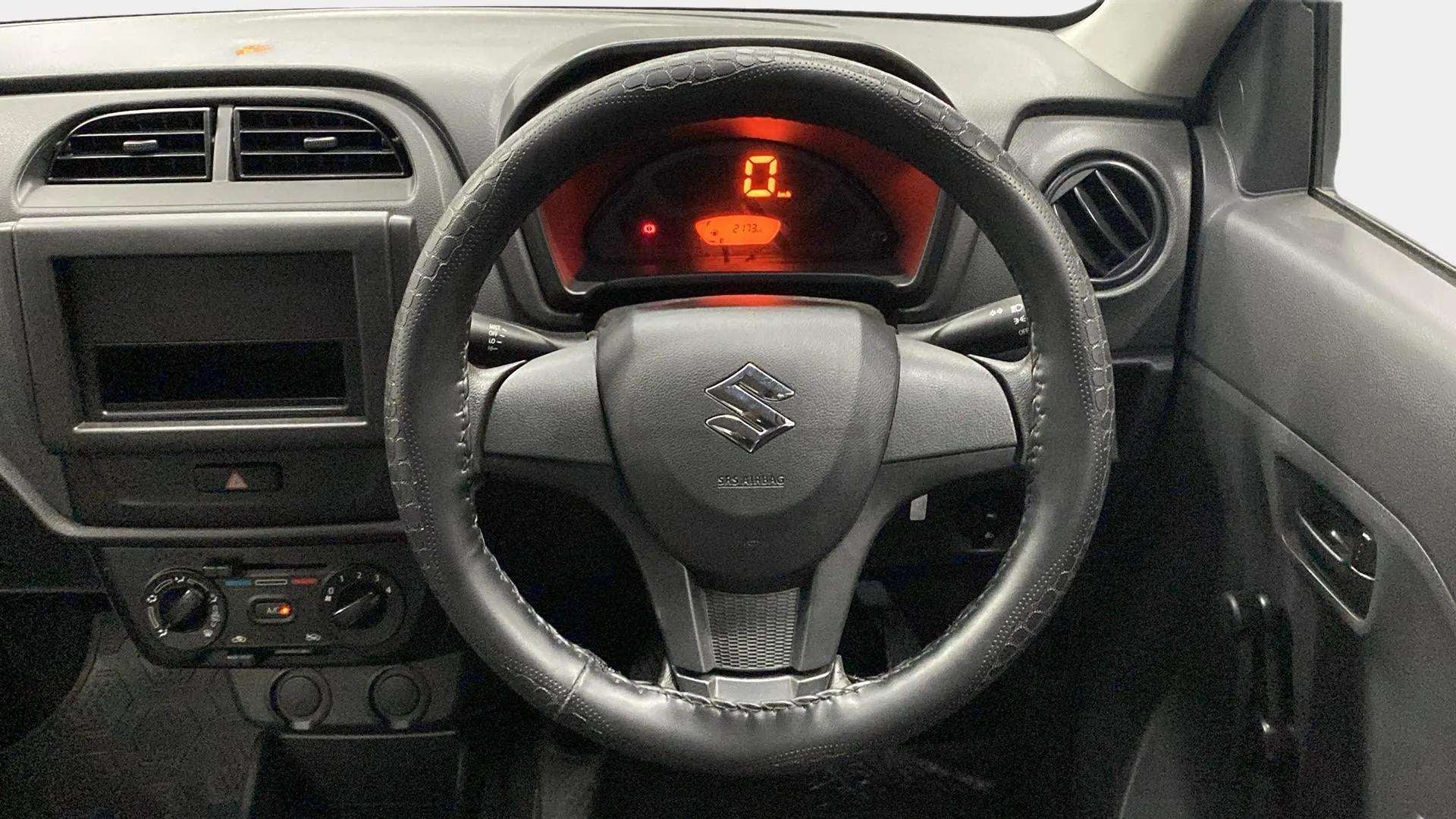 Interior dashboard view of a Maruti Suzuki Alto K10