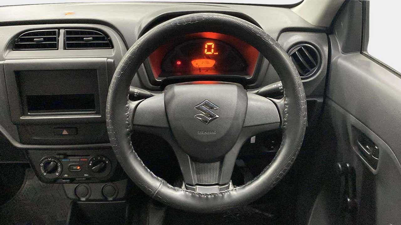 Interior dashboard view of a Maruti Suzuki Alto K10
