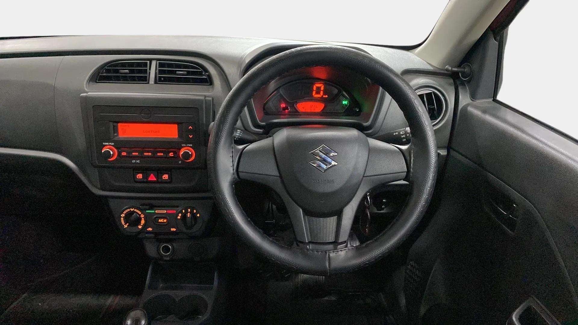 Interior dashboard and steering wheel of a Maruti Suzuki Alto K10