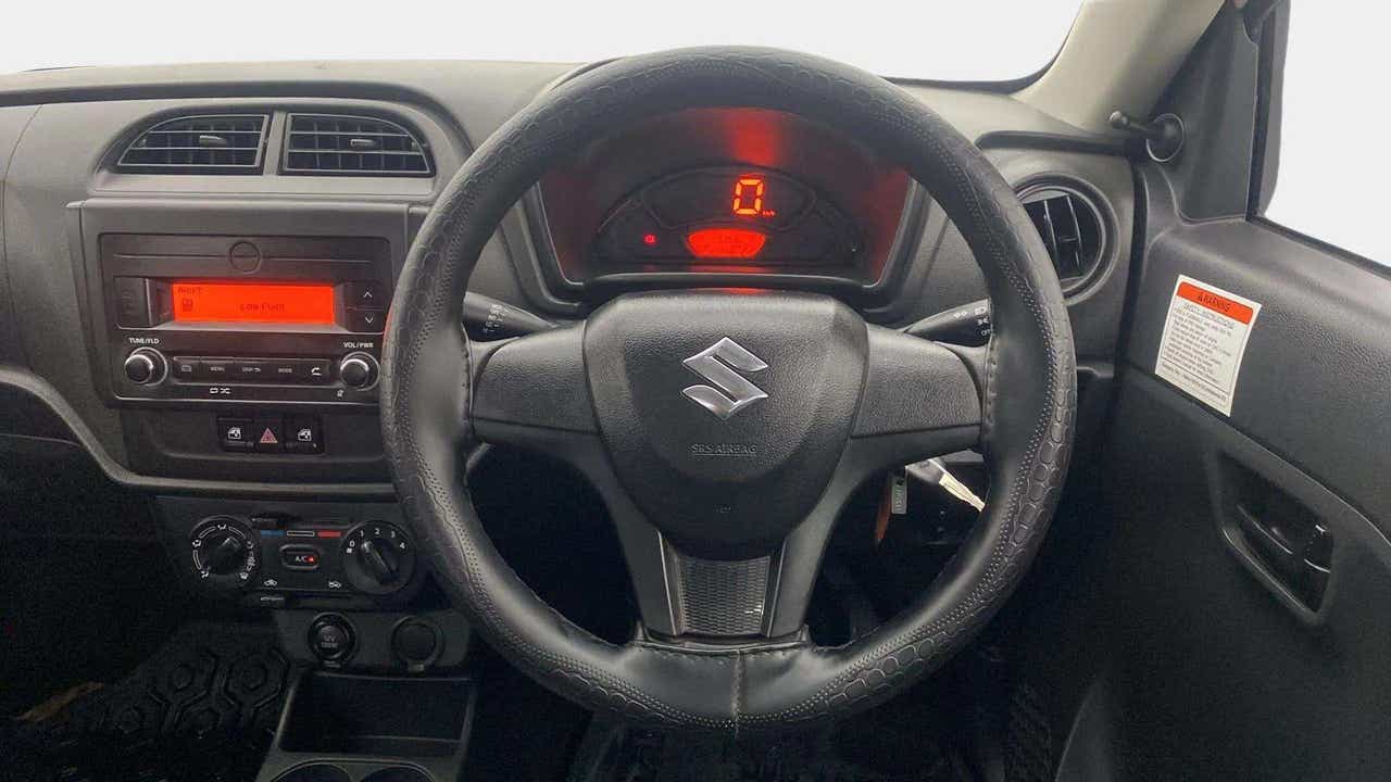 Interior dashboard and steering wheel of a Maruti Suzuki Alto K10