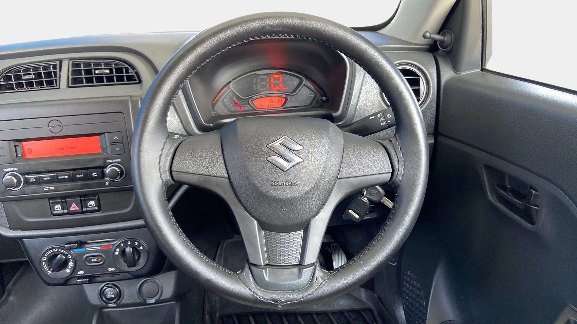 Interior dashboard view of a Maruti Suzuki Alto K10