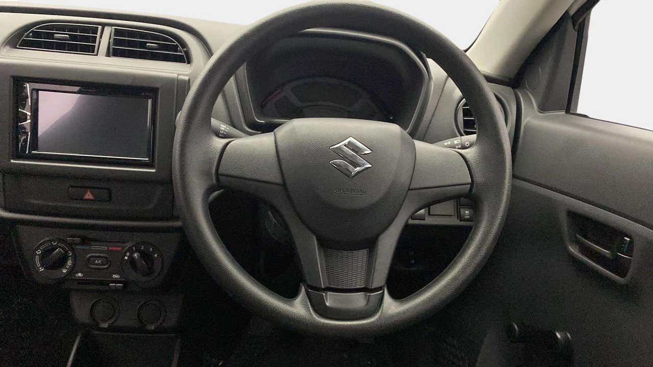 Interior dashboard and steering wheel of a Maruti Suzuki Alto K10