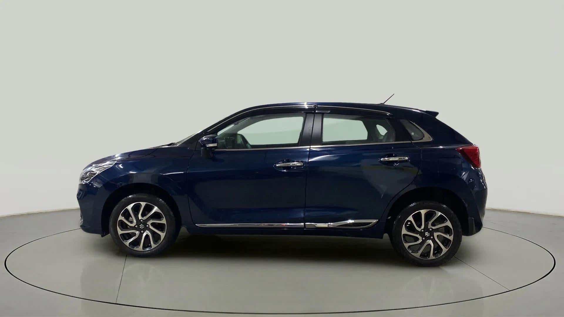 Side view of a Nexa Blue Maruti Suzuki Baleno