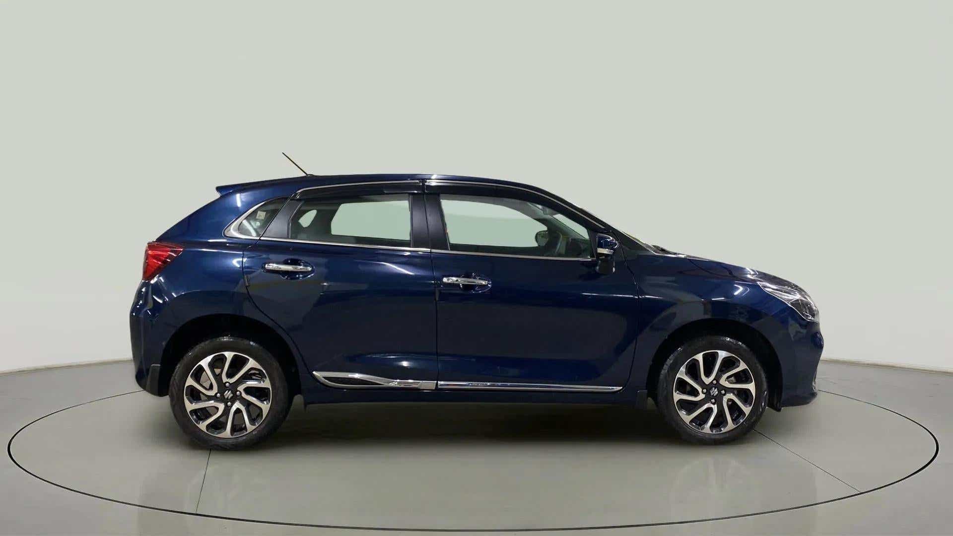 Side view of a Nexa Blue Maruti Suzuki Baleno