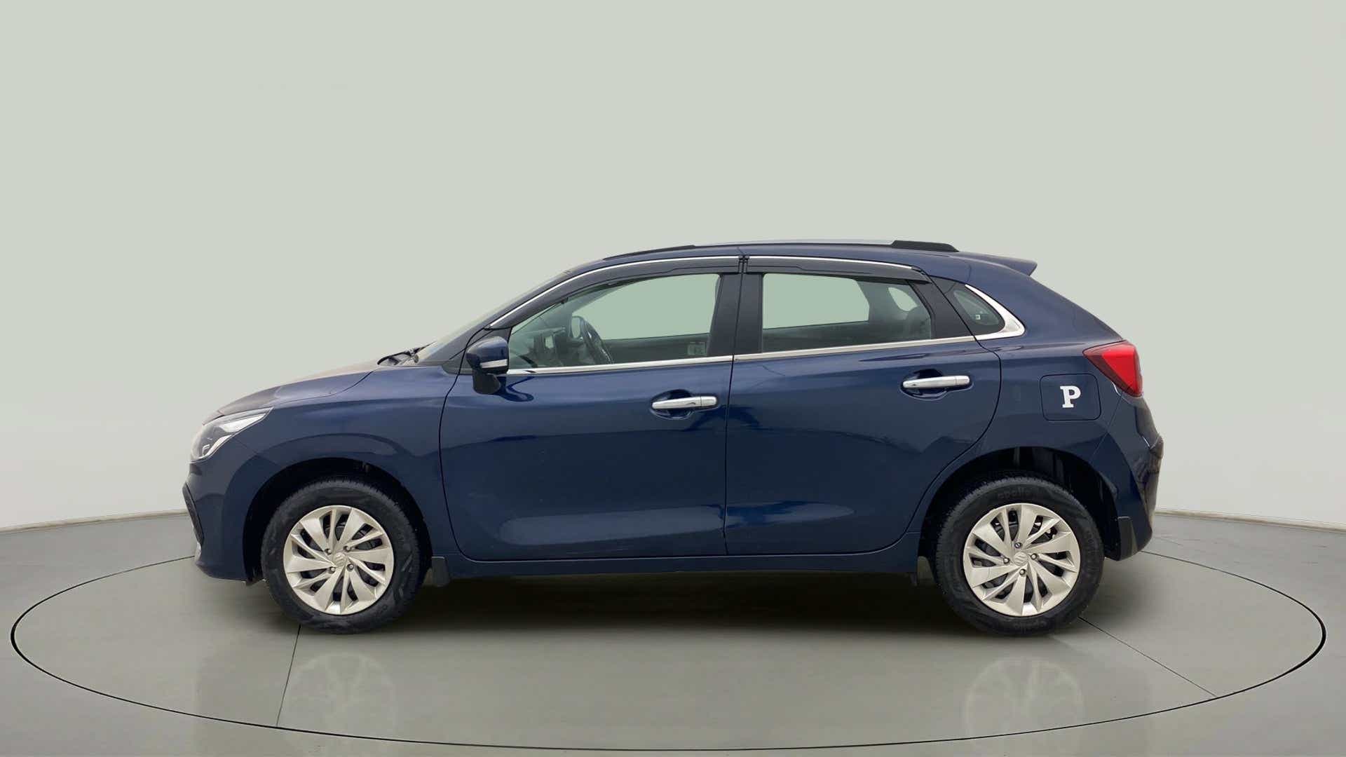 Side view of a Nexa Blue Maruti Suzuki Baleno
