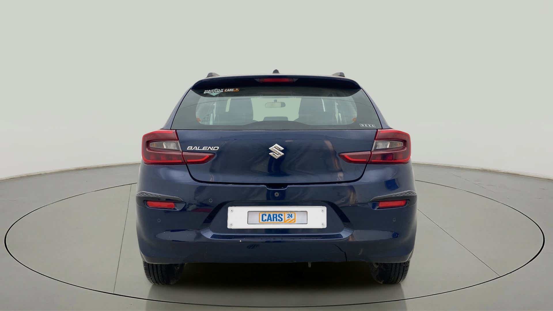 Rear view of a Nexa Blue Maruti Suzuki Baleno