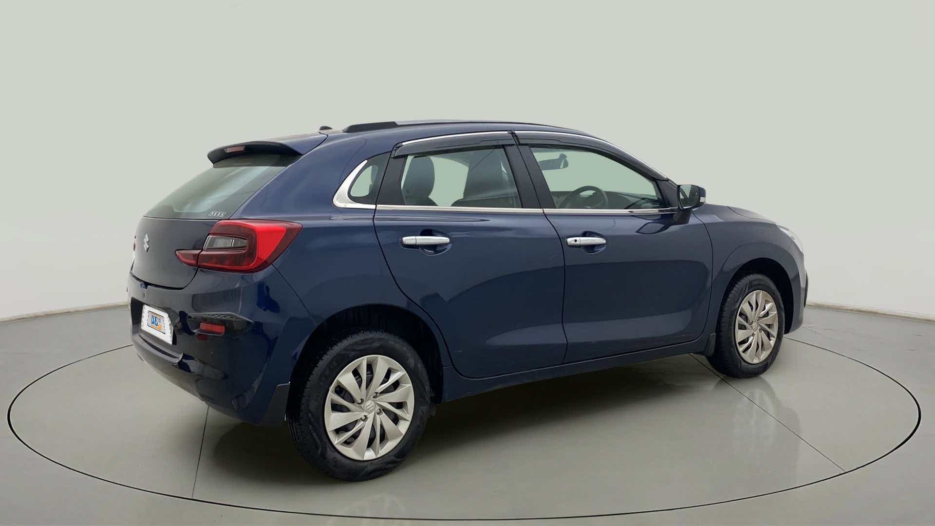 Rear three-quarter of a Nexa Blue Maruti Suzuki Baleno