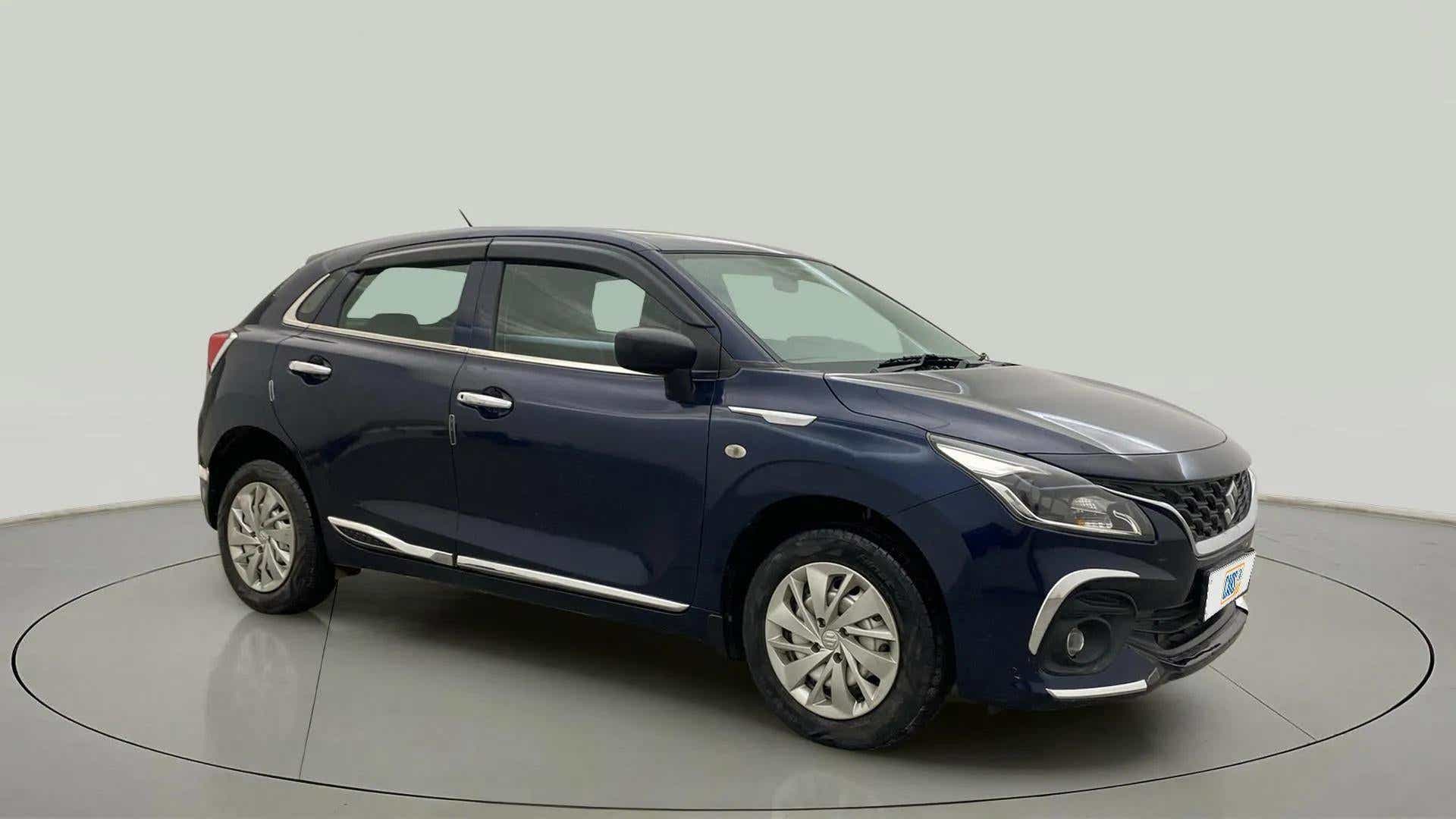 Front three-quarter view of a Nexa Blue Maruti Suzuki Baleno