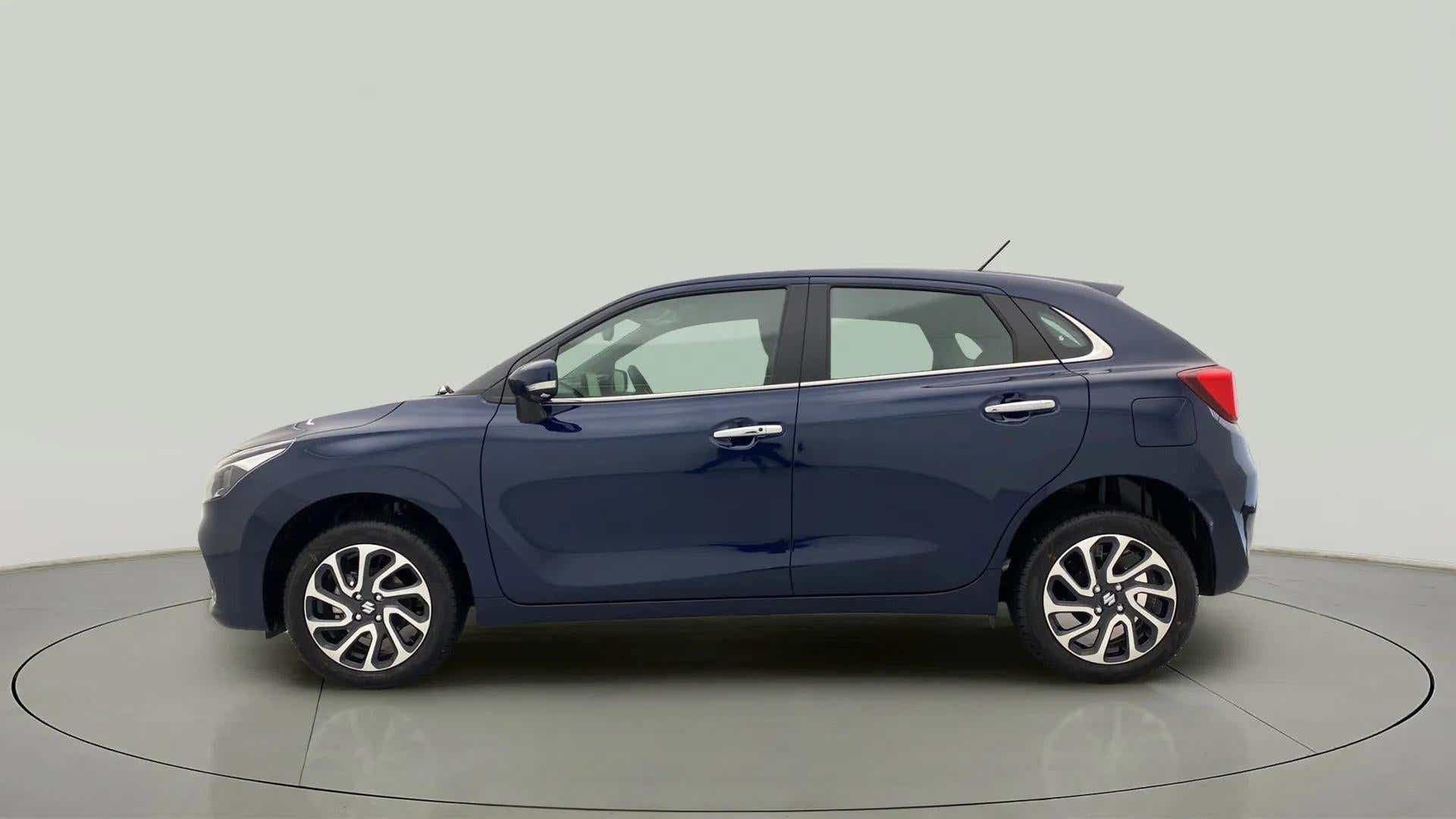 Side view of a Nexa Blue Maruti Suzuki Baleno