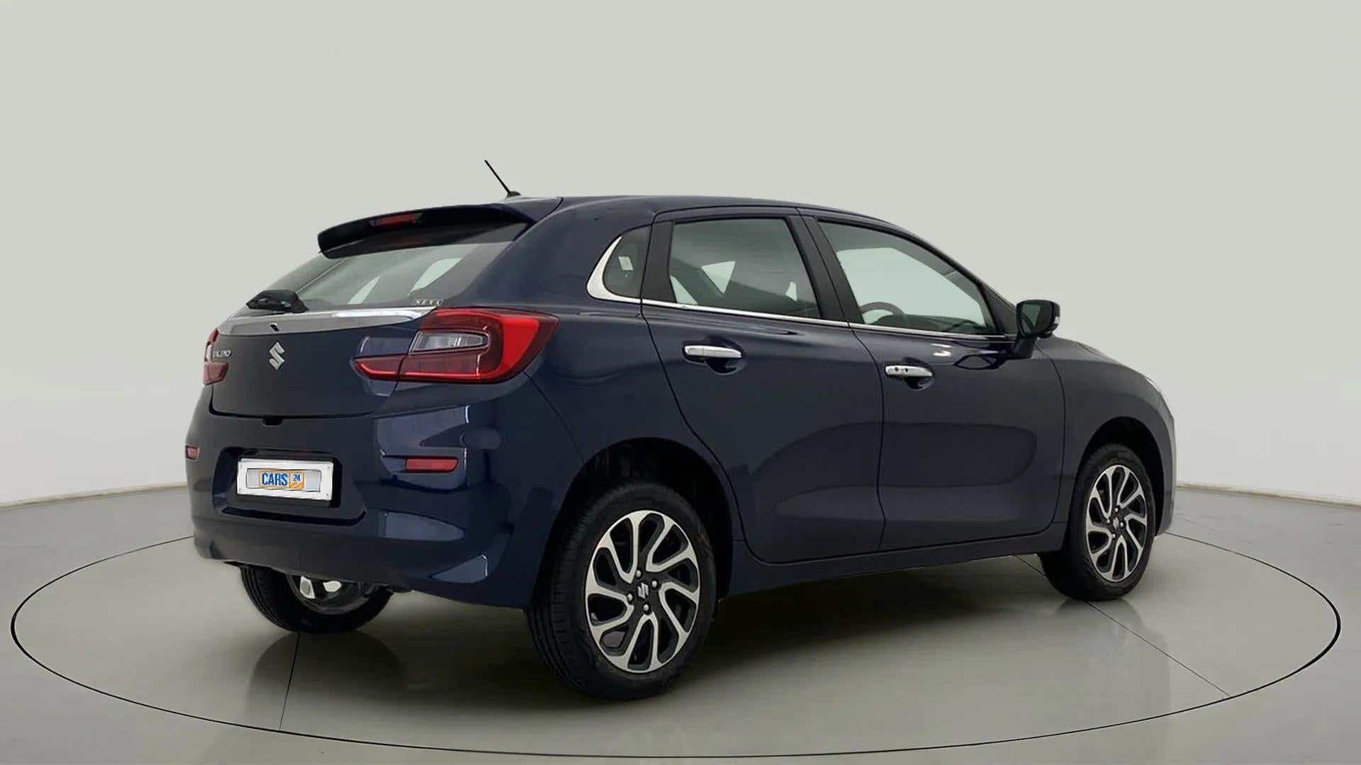 Rear three-quarter view of a Nexa Blue Maruti Suzuki Baleno