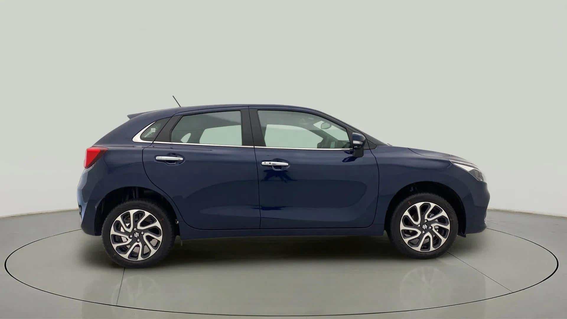 Side view of a Nexa Blue Maruti Suzuki Baleno