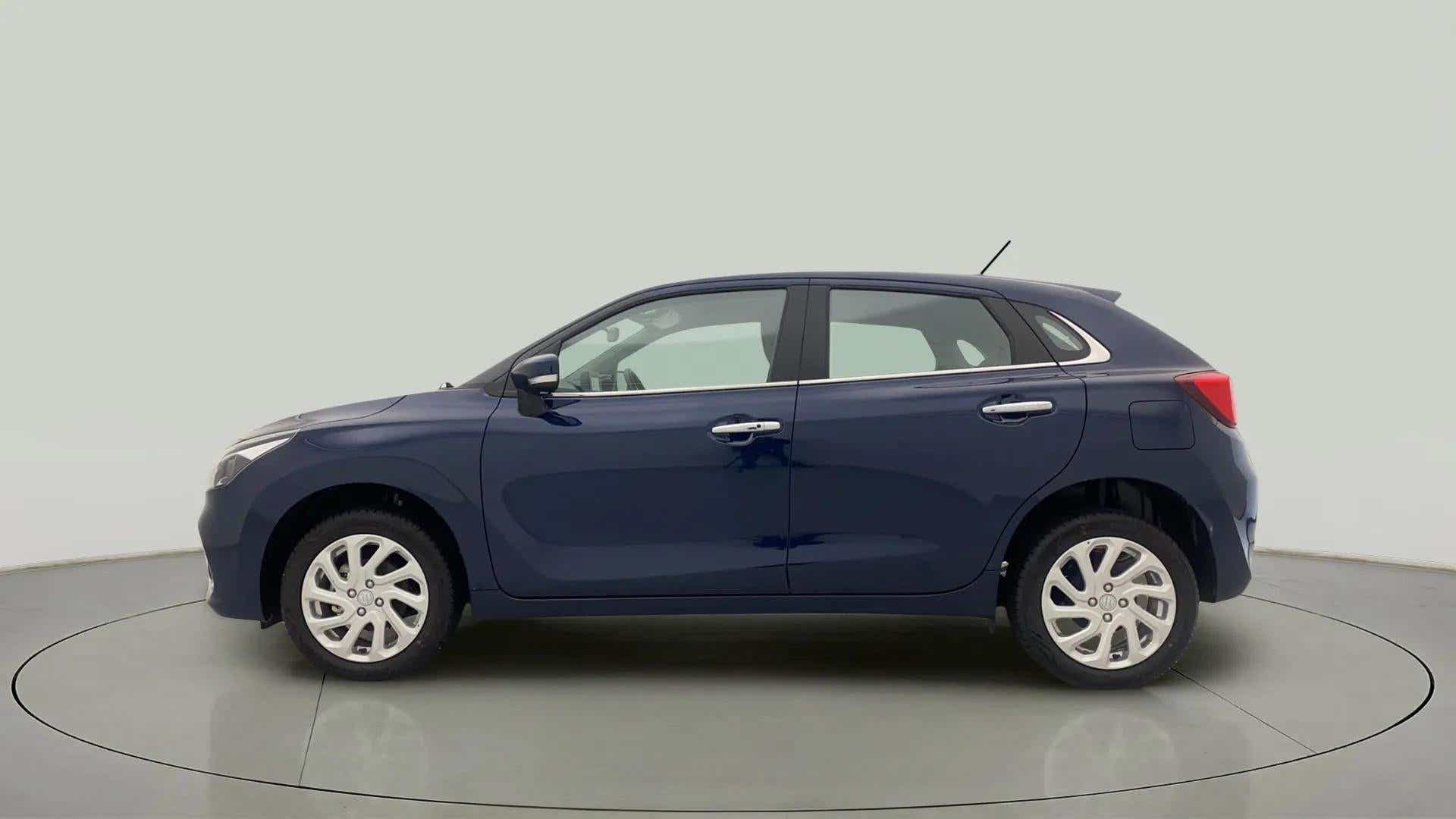 Side view of a Nexa Blue Maruti Suzuki Baleno