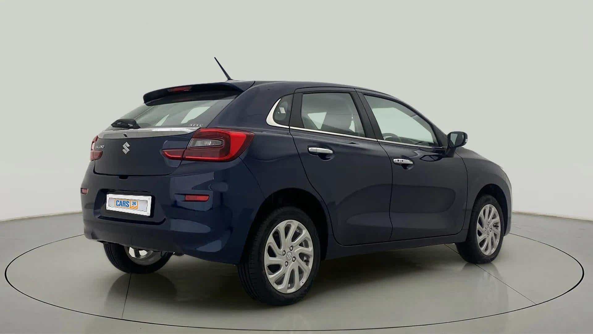 Rear three-quarter of a Nexa Blue Maruti Suzuki Baleno
