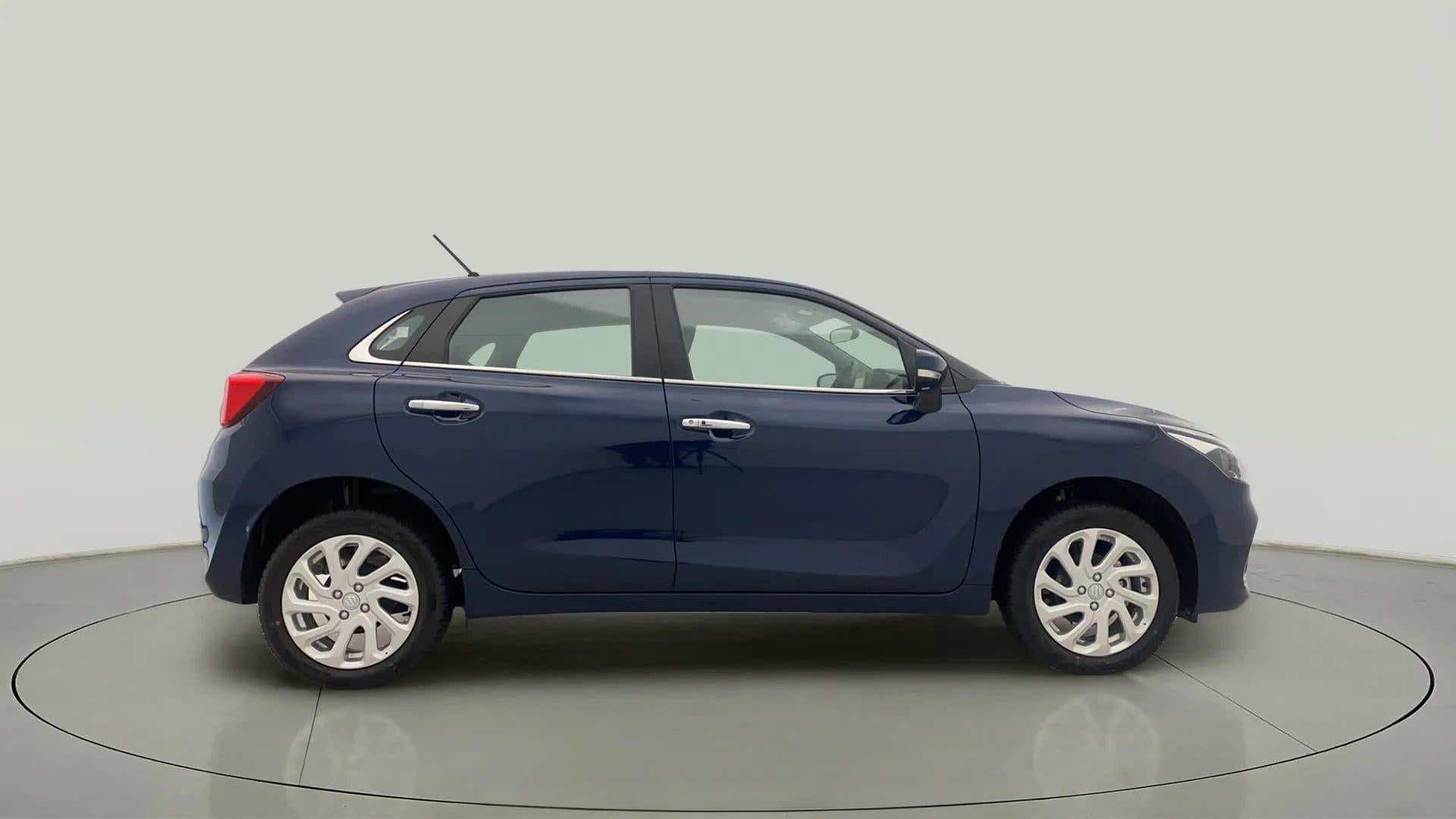 Side view of a Nexa Blue Maruti Suzuki Baleno