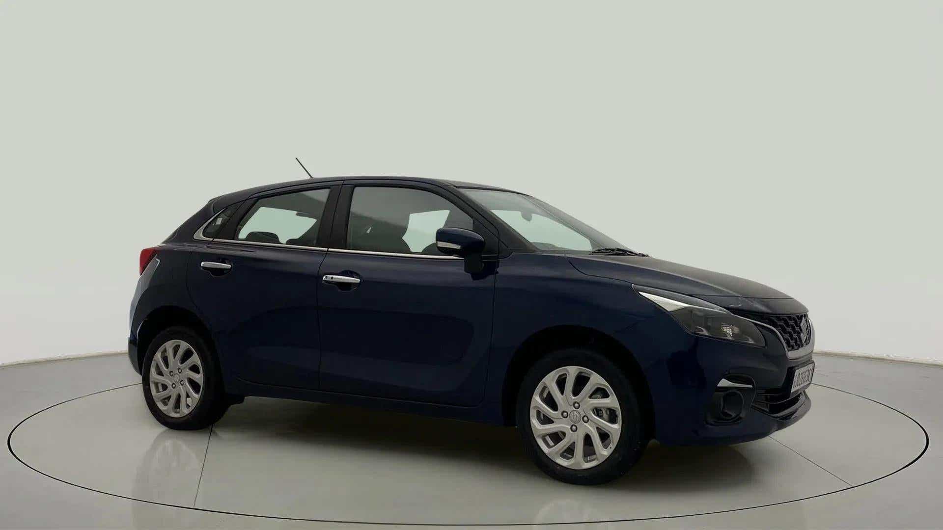 Side view of a Nexa Blue Maruti Suzuki Baleno